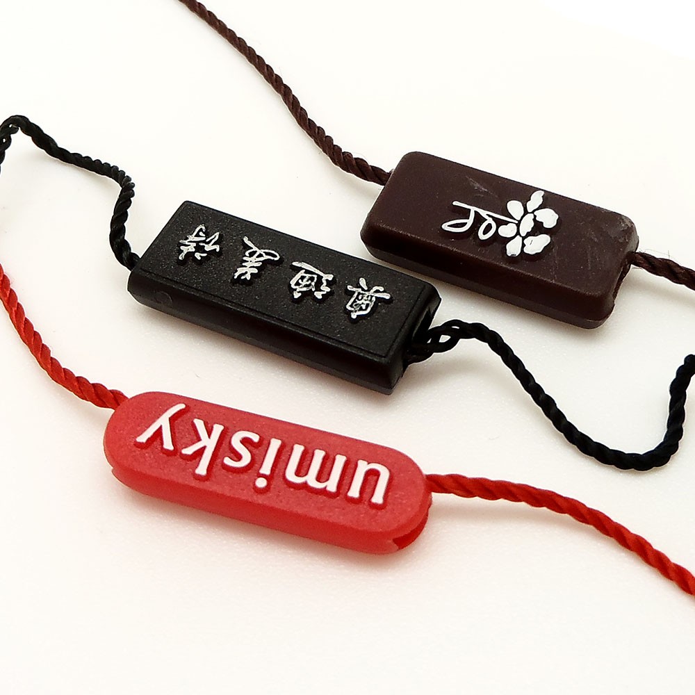 服装樱桃视频大全免费高清版之吊牌吊粒